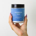 Dead Sea magnesium flakes, Dead Sea salt, sodium chloride, eucalyptus oil, Eucalyptus globulus, bath soak, vegan, clean, non-GMO, cruelty-free, pure, ethical, self-care, relaxation, muscle relief, detox, skin rejuvenation, stress relief, natural, soothing, aromatic, wellness, rejuvenating, therapeutic, mineral-rich, bath ritual, calming, rejuvenate, healing.